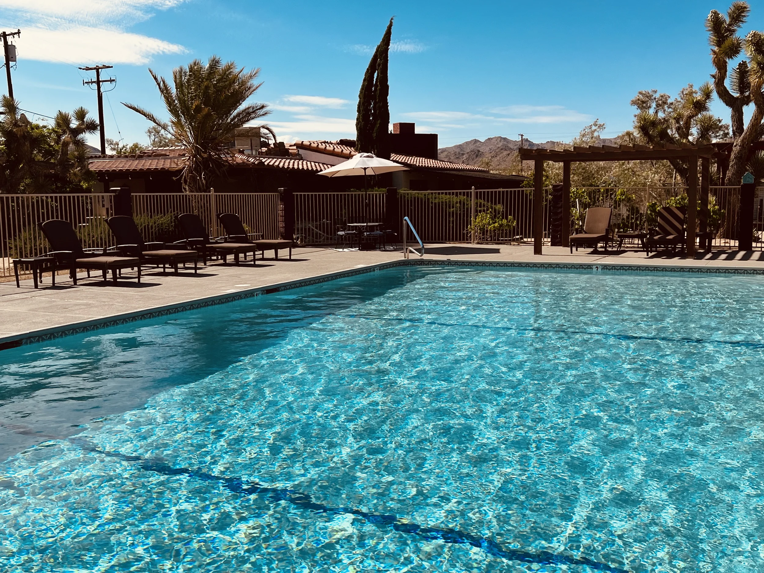 A view of the inn across the swimming pool. 