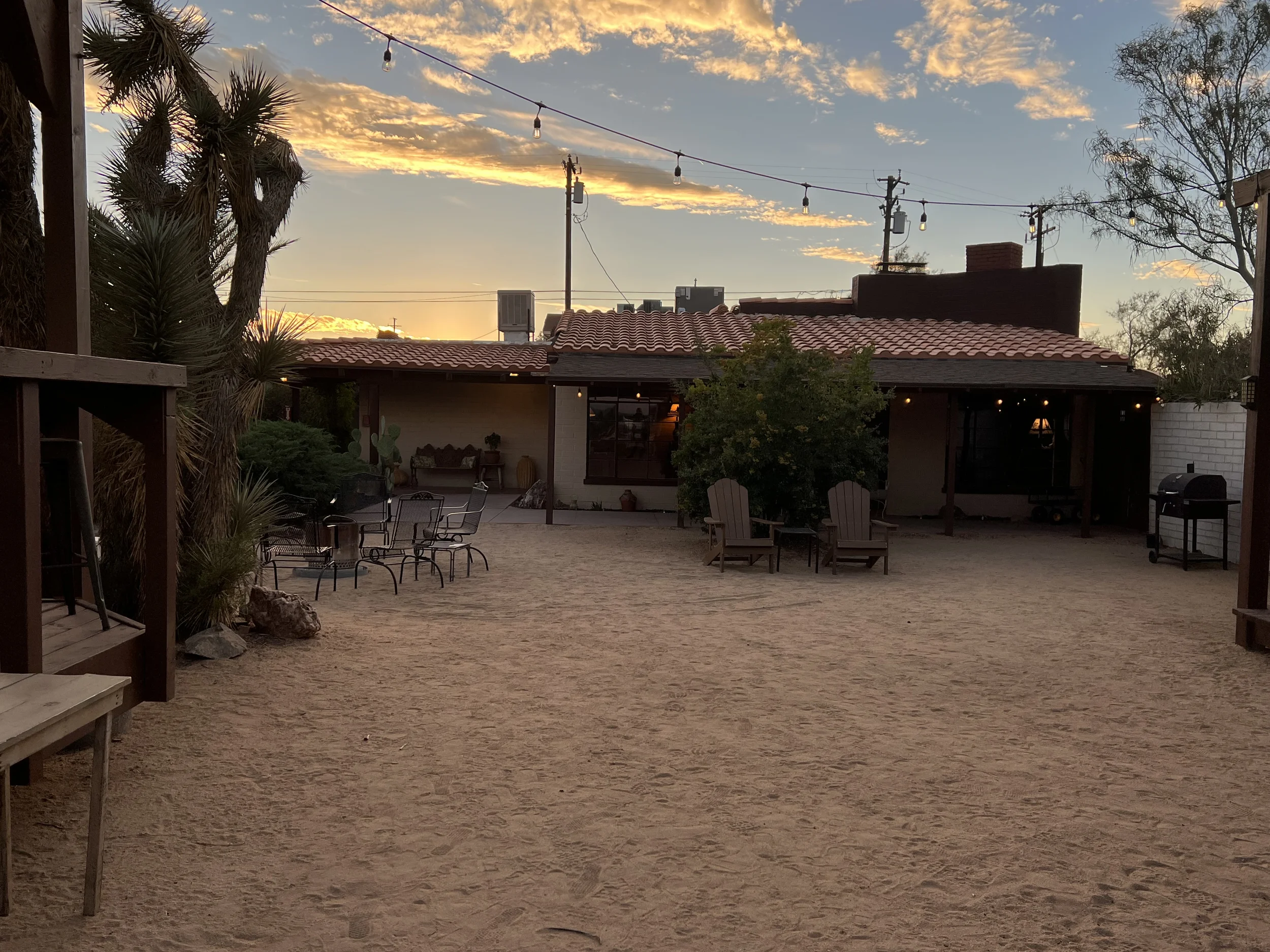 A photo of the inns courtyard during a sunset. 